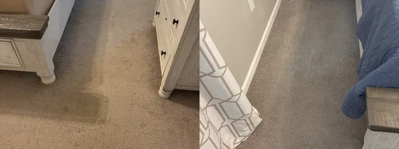 Tan bedroom carpet with a dark traffic path beside clean tan carpet next to a bed