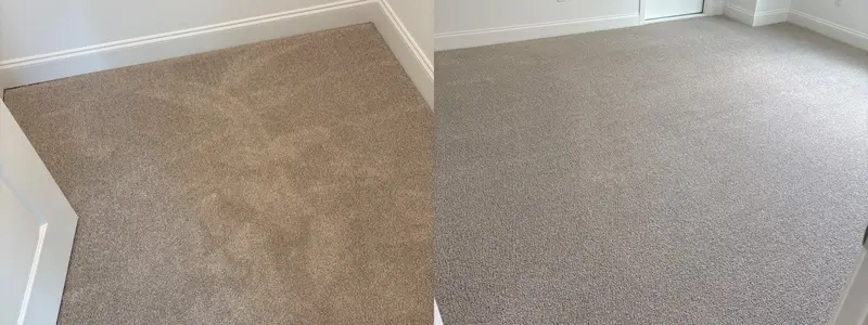 Empty room with beige carpet showing brown traffic soiling beside clean light carpet along white baseboards