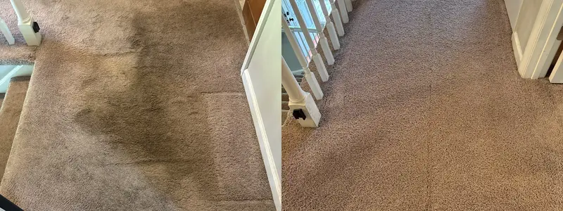 Carpeted stair landing with dark traffic soiling beside the same landing clean by the banister